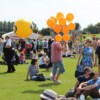 Kaveh handing out balloons