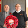 Les and Denis laying remembrance wreath on behalf of branch