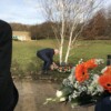 Terry laying a wreath