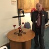 Les Timbey next to Remembrance Memorial