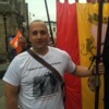 Kaveh Damestani carrying the Durham LA banner