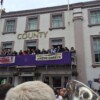 Tim Roache on balcony