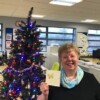 Lynda Walker with her gift vouchers